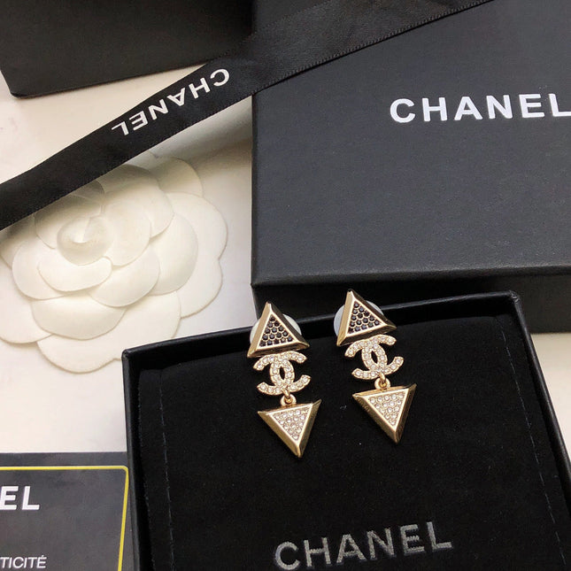 CHANEL 26S DOUBLE C LOGO TWO-TONE CRYSTAL TRIANGLE DROP EARRINGS IN GOLD METAL 631834