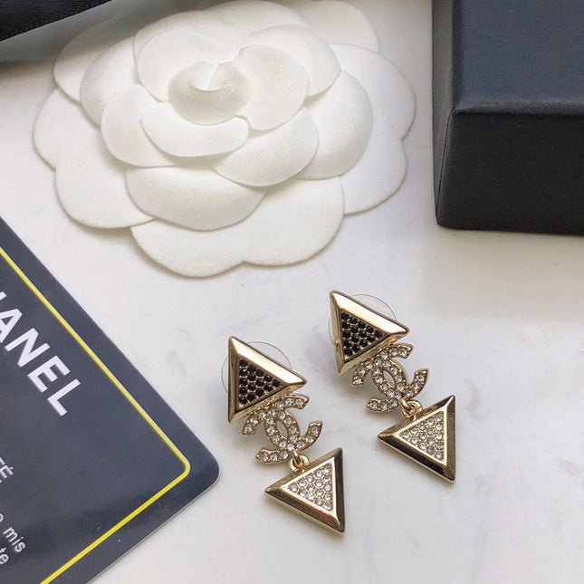 CHANEL 26S DOUBLE C LOGO TWO-TONE CRYSTAL TRIANGLE DROP EARRINGS IN GOLD METAL 631834